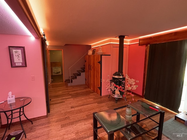 hall featuring stairway and light wood-style flooring