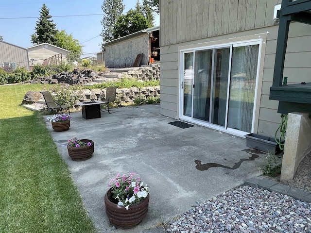 view of patio / terrace with a fire pit