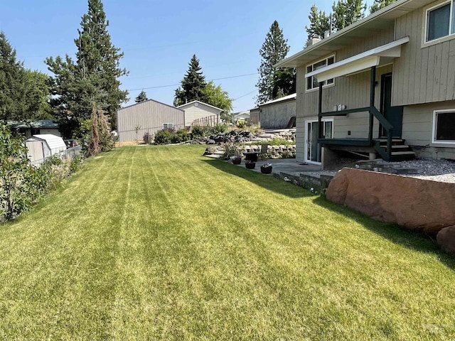 view of yard with fence