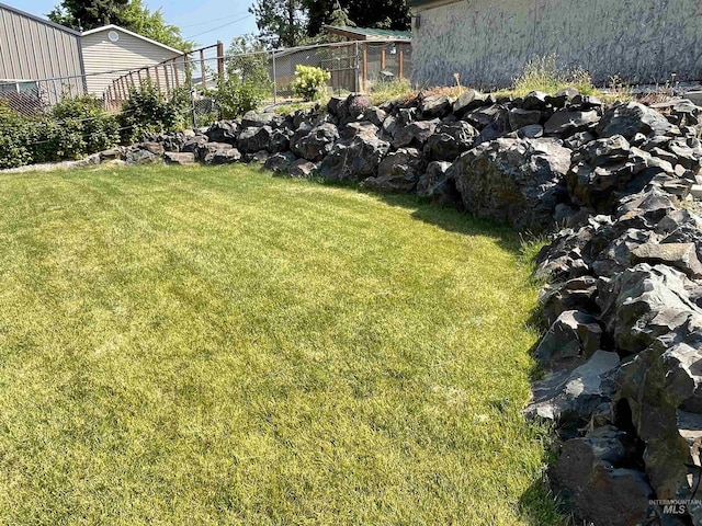 view of yard featuring fence