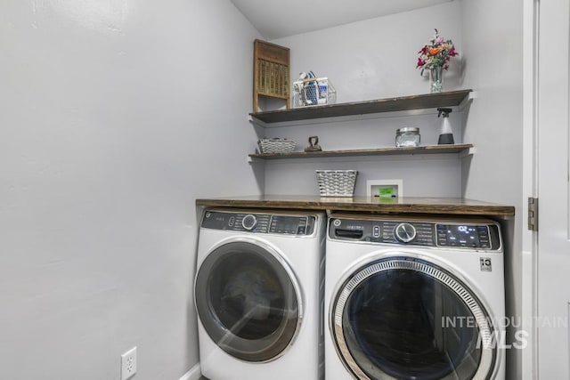 1003 Lauren Ln, Filer, ID 83328 - washroom featuring laundry area and washing machine and dryer