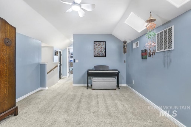 1003 Lauren Ln, Filer, ID 83328 - living area featuring visible vents, an upstairs landing, carpet flooring, baseboards, and vaulted ceiling