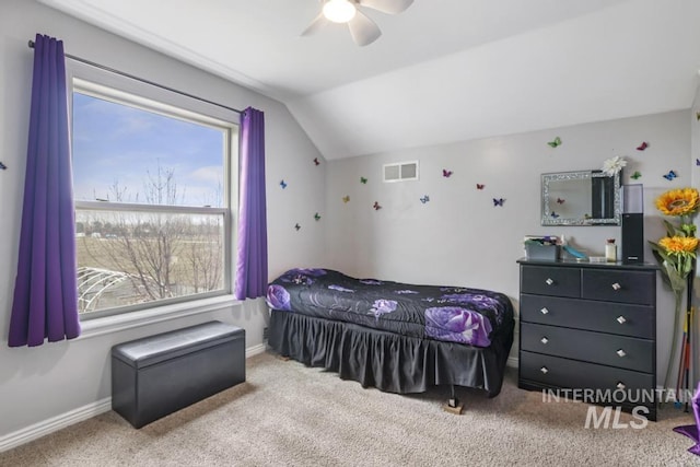 1003 Lauren Ln, Filer, ID 83328 - carpeted bedroom with visible vents, baseboards, a ceiling fan, and vaulted ceiling