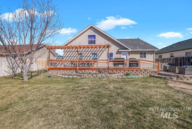 1003 Lauren Ln, Filer, ID 83328 - rear view of property with a deck, a yard, and a fenced backyard