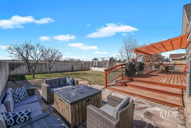 1003 Lauren Ln, Filer, ID 83328 - deck featuring an outdoor living space, outdoor dining area, a fenced backyard, and a pergola
