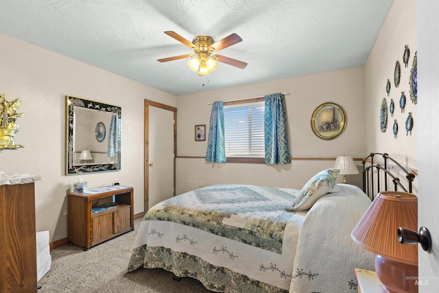 bedroom featuring baseboards, ceiling fan, and light colored carpet