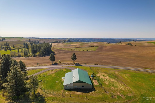 birds eye view of property featuring a rural view