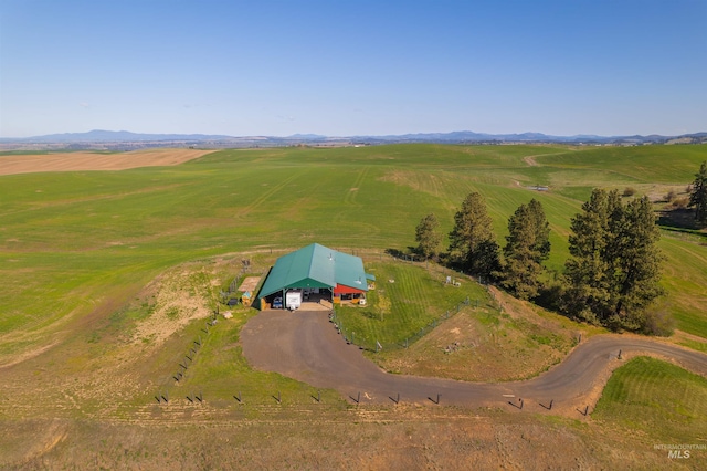 bird's eye view featuring a mountain view and a rural view