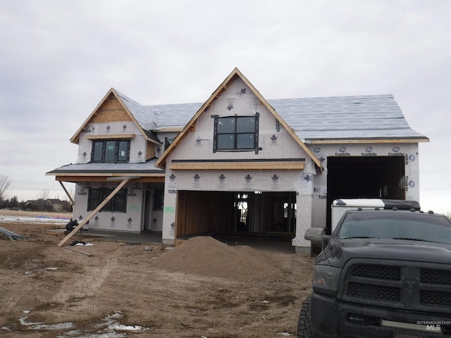 property in mid-construction featuring a garage