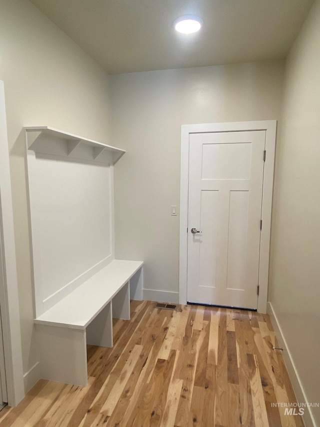 2504 E Hidden Creek St, Nampa, ID 83687 - mudroom with light wood-style floors and baseboards
