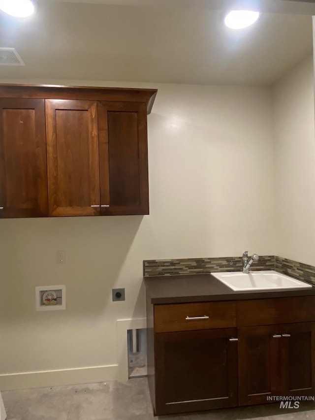 2504 E Hidden Creek St, Nampa, ID 83687 - washroom with hookup for an electric dryer, cabinet space, hookup for a washing machine, and baseboards