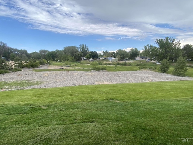2504 E Hidden Creek St, Nampa, ID 83687 - surrounding community with a lawn