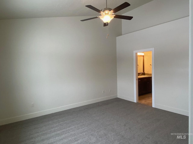 2504 E Hidden Creek St, Nampa, ID 83687 - unfurnished bedroom with dark colored carpet, baseboards, ensuite bath, a sink, and a high ceiling