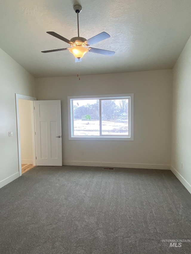 2504 E Hidden Creek St, Nampa, ID 83687 - carpeted spare room featuring baseboards and ceiling fan