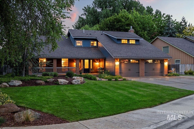 173 E Fall Dr, Boise, ID 83706 - view of front of home featuring driveway, a porch, a chimney, and roof with shingles