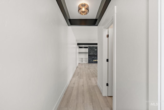 hallway with light wood-type flooring