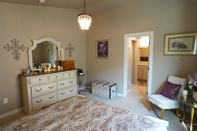 2431 Legacy Ct, Clarkston, WA 99403 - bedroom featuring light colored carpet, lofted ceiling, baseboards, a chandelier, and ensuite bathroom
