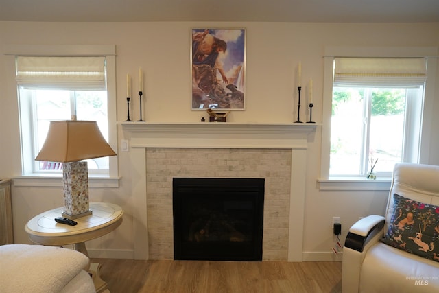 2431 Legacy Ct, Clarkston, WA 99403 - living room with wood finished floors, a fireplace, and baseboards