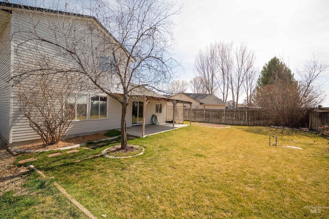 view of yard with a fenced backyard and a patio