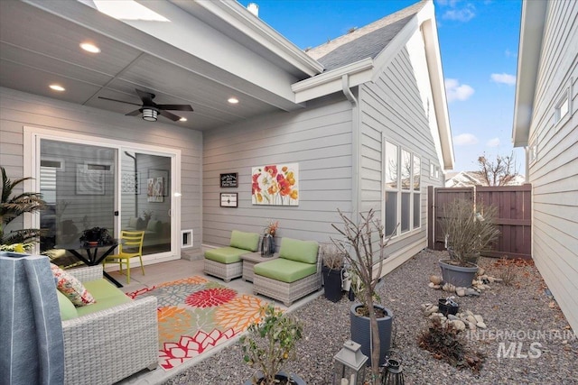 view of patio featuring an outdoor living space and ceiling fan