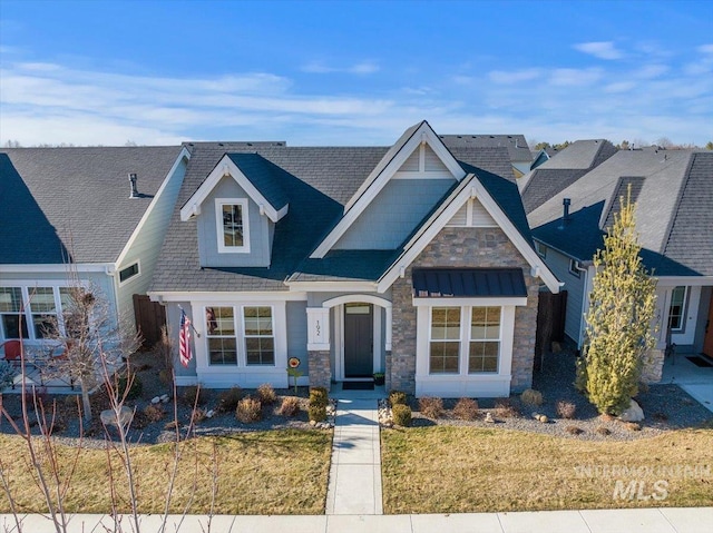 view of front of home with a front yard