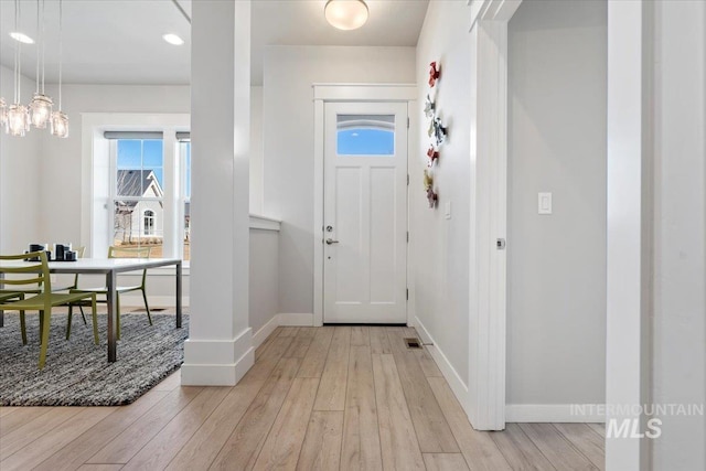 entrance foyer with light wood-type flooring