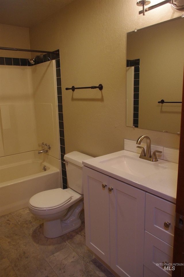 full bathroom featuring vanity, toilet, and shower / washtub combination