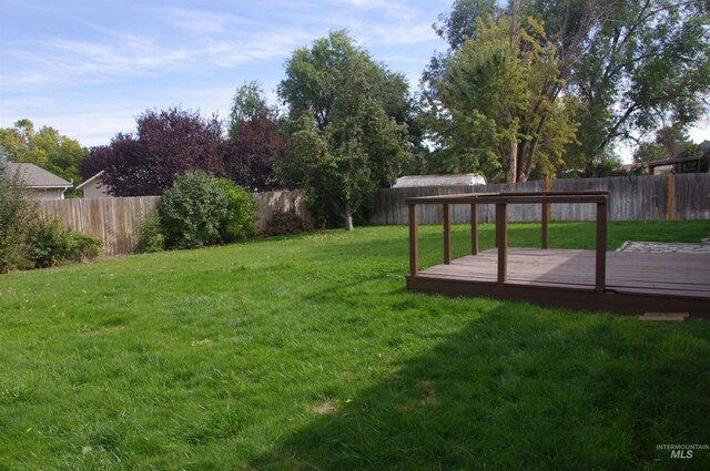 view of yard featuring a deck