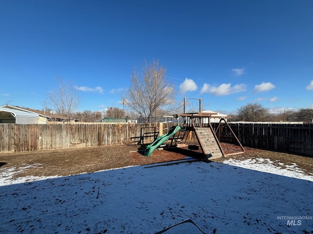 view of snow covered playground