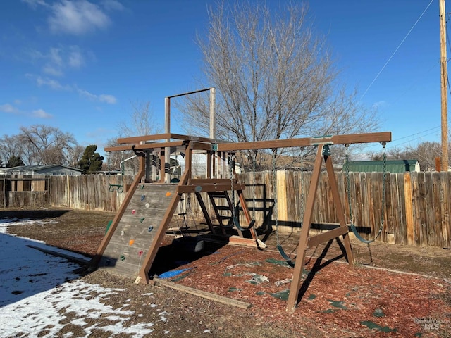 view of snow covered playground