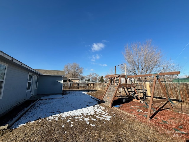 view of yard with a playground and a patio