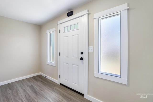 entrance foyer featuring light hardwood / wood-style floors