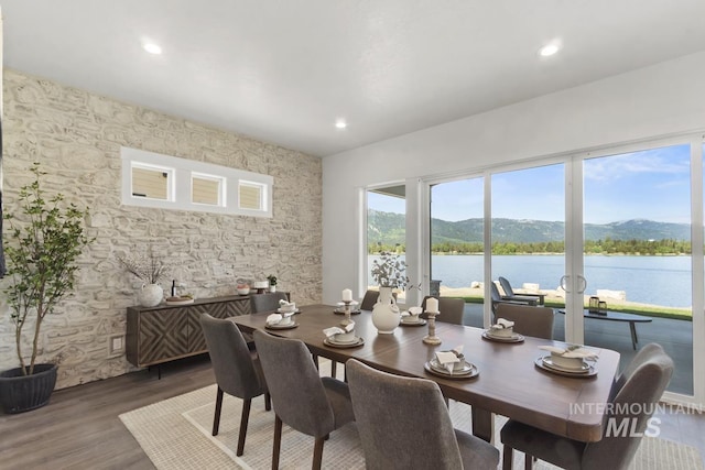 12975 Sandy Dr, Donnelly, ID 83615 - dining space featuring wood finished floors, recessed lighting, and a water and mountain view