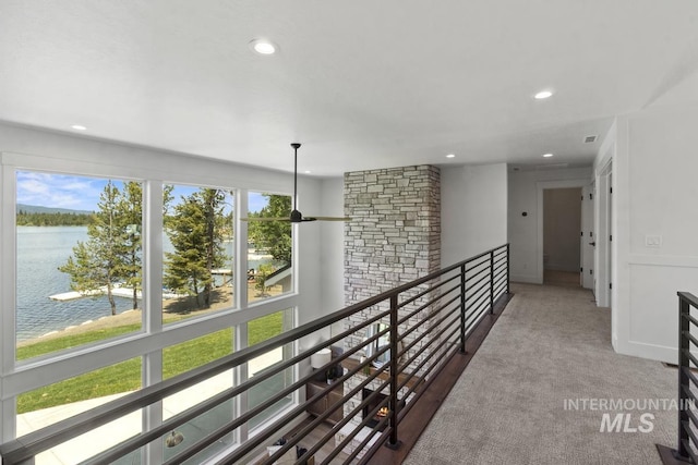 12975 Sandy Dr, Donnelly, ID 83615 - hallway with a water view, an upstairs landing, recessed lighting, and carpet floors