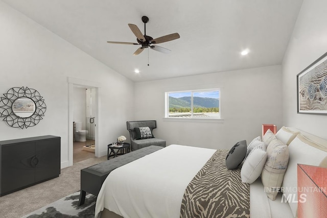 12975 Sandy Dr, Donnelly, ID 83615 - carpeted bedroom with vaulted ceiling, recessed lighting, ensuite bathroom, baseboards, and a ceiling fan