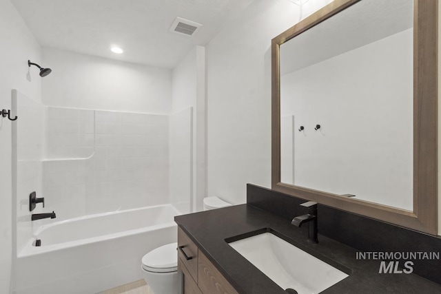 12975 Sandy Dr, Donnelly, ID 83615 - bathroom with toilet, vanity, bathing tub / shower combination, and recessed lighting