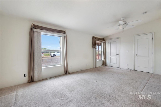 4240 N 1400 E, Buhl, ID 83316 - empty room with carpet, a ceiling fan, and lofted ceiling