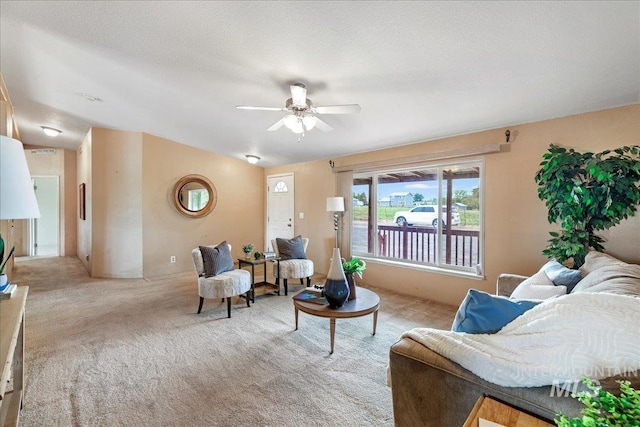 4240 N 1400 E, Buhl, ID 83316 - living area featuring carpet flooring, a ceiling fan, and lofted ceiling