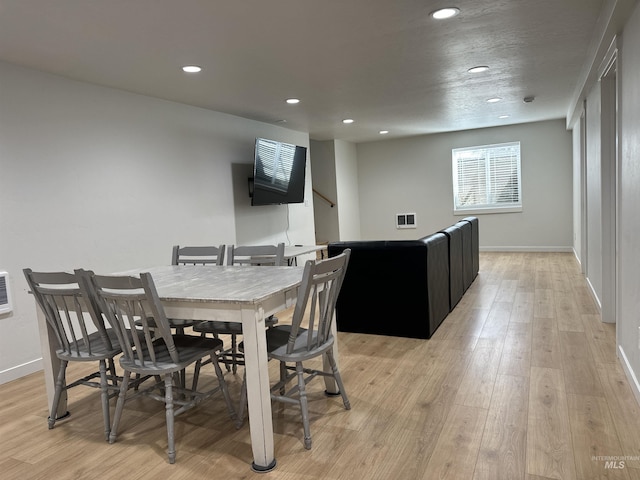 dining room featuring visible vents, recessed lighting, light wood-type flooring, and baseboards