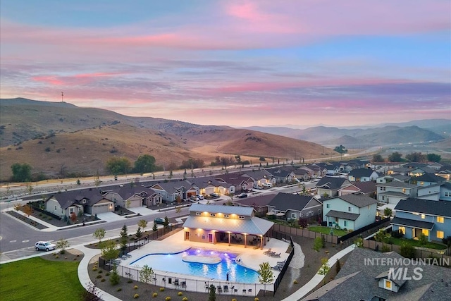 aerial view at dusk with a mountain view