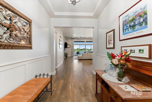 547 S Rivermist Ave, Star, ID 83669 - corridor featuring dark wood finished floors, a wainscoted wall, and a decorative wall