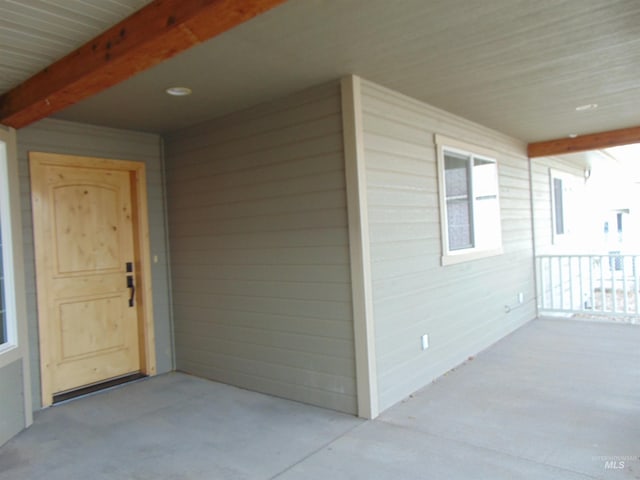 entrance to property with a porch