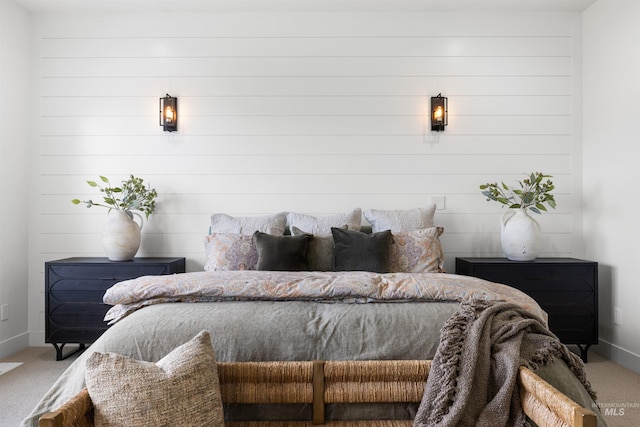 carpeted bedroom with baseboards
