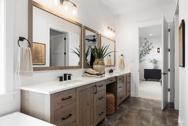 full bathroom featuring a sink and double vanity