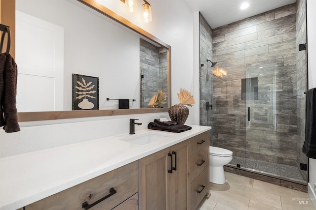 full bathroom with recessed lighting, a shower stall, tile patterned flooring, toilet, and vanity