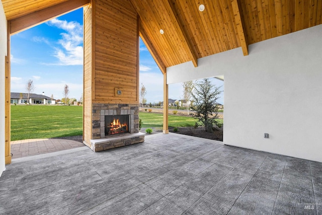 view of patio / terrace with an outdoor stone fireplace