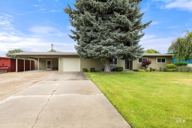 222 Dawn St, Eagle, ID 83616 - view of front facade featuring an attached garage, a carport, a front lawn, and concrete driveway