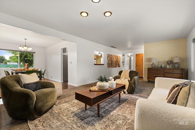 222 Dawn St, Eagle, ID 83616 - living room with a chandelier and baseboards