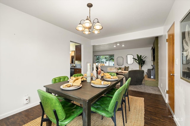 222 Dawn St, Eagle, ID 83616 - dining room featuring a chandelier and dark wood-style flooring