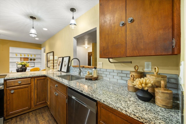 222 Dawn St, Eagle, ID 83616 - kitchen featuring dishwasher, light stone counters, dark wood-style floors, decorative backsplash, and pendant lighting